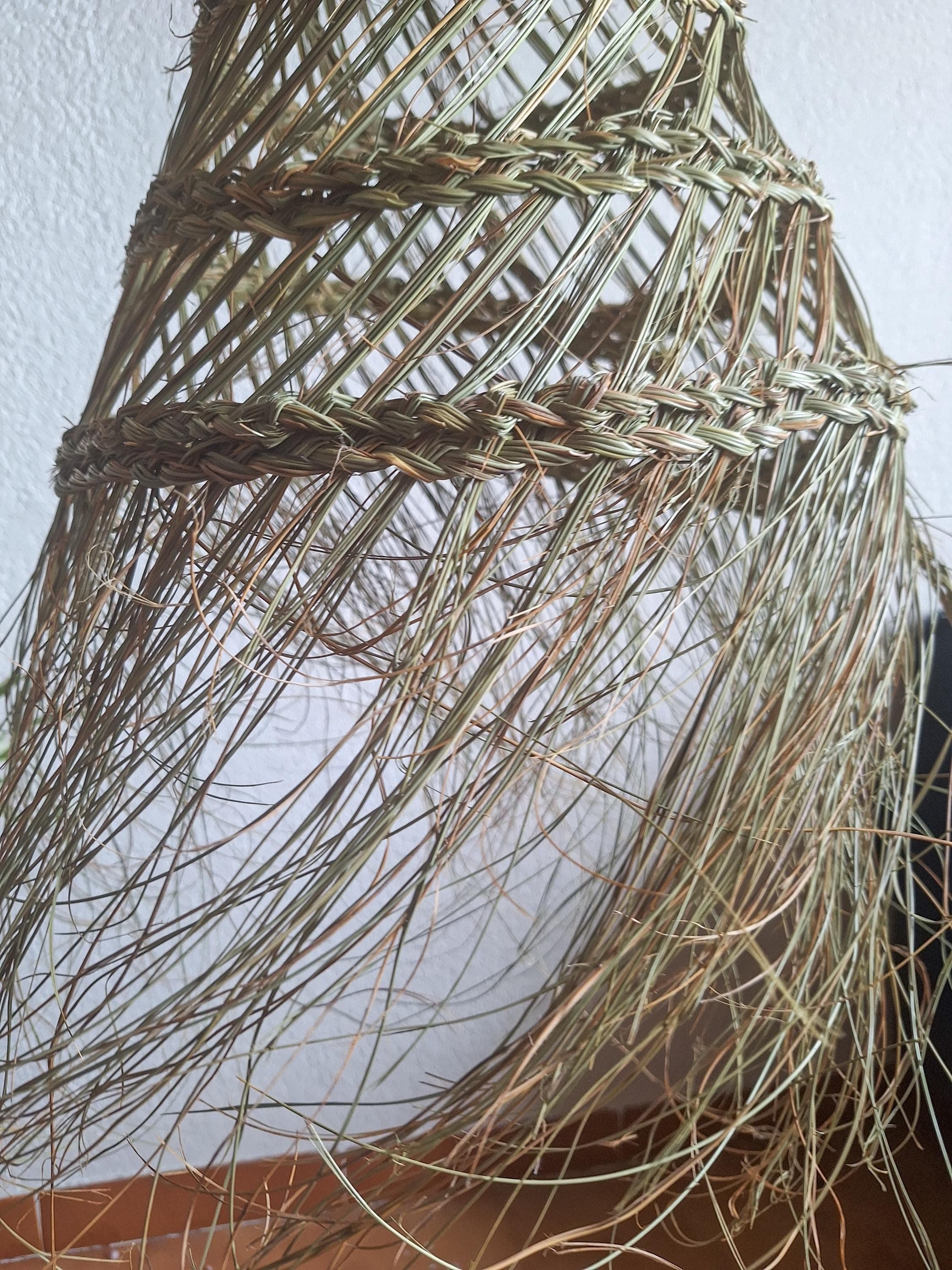 Openwork conical palm leaf pendant light