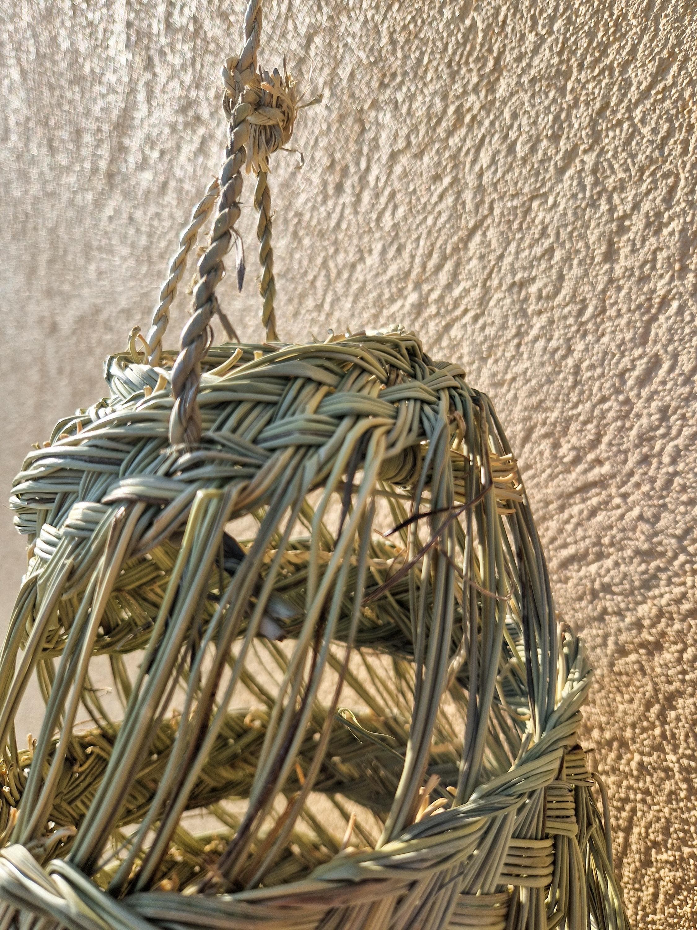 Suspension cylindrique ajourée en feuilles de palmier