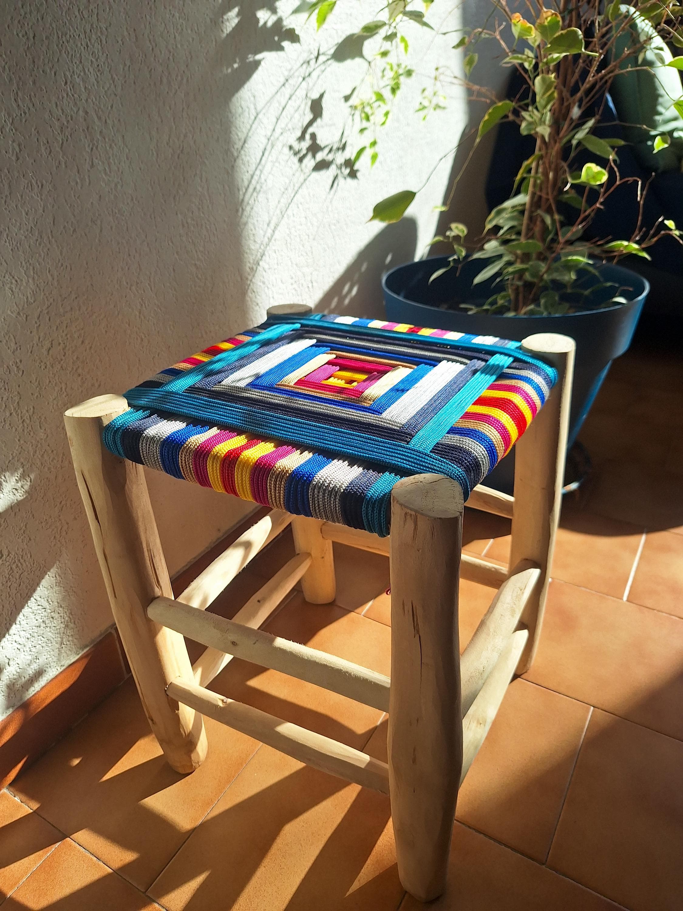 Boho stool in wood and colorful weaving