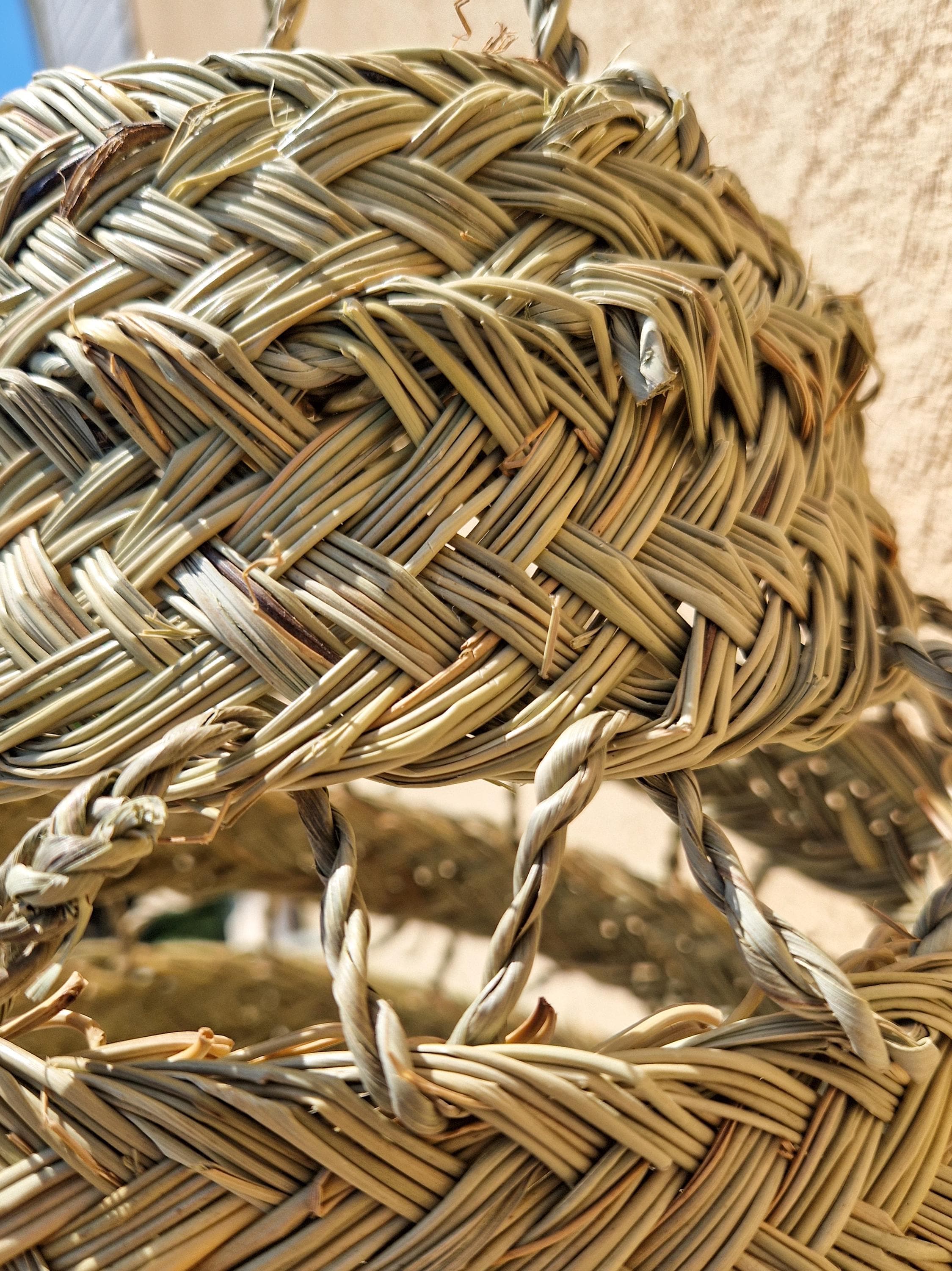 Suspension ajourée en feuille de palmier