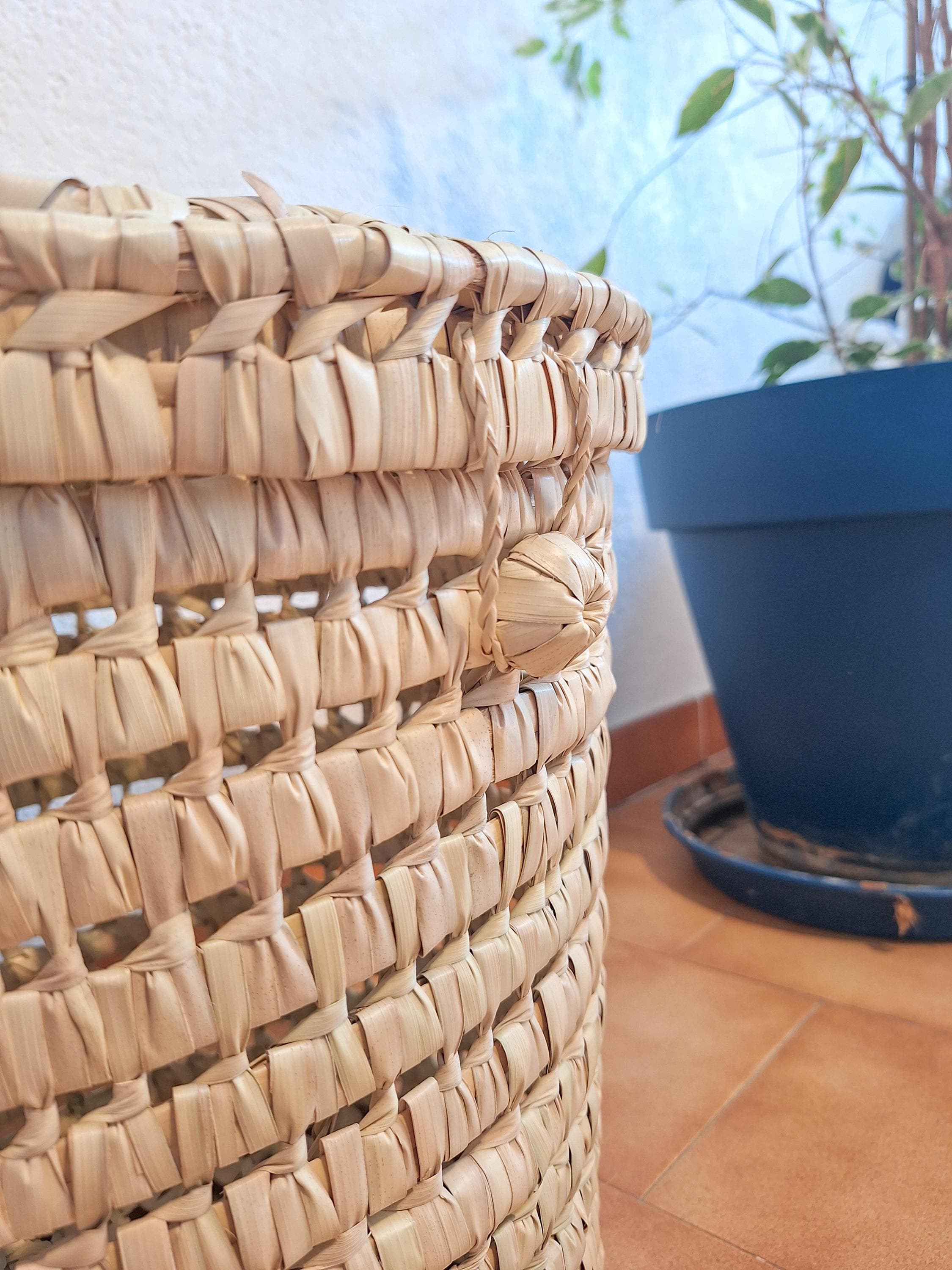 Malle de rangement circulaire en feuille de palmier