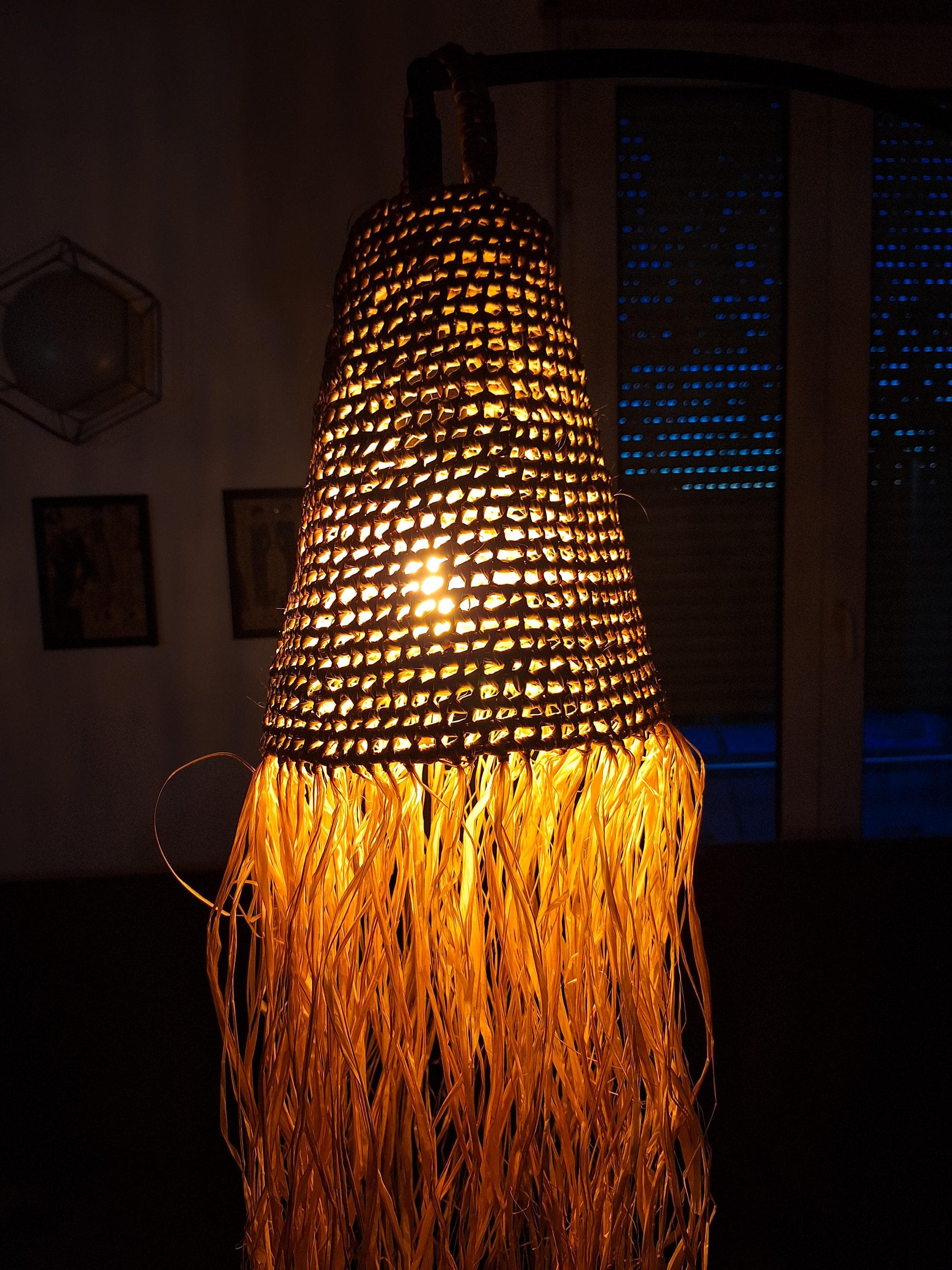 Suspension bohème en feuilles de palmier