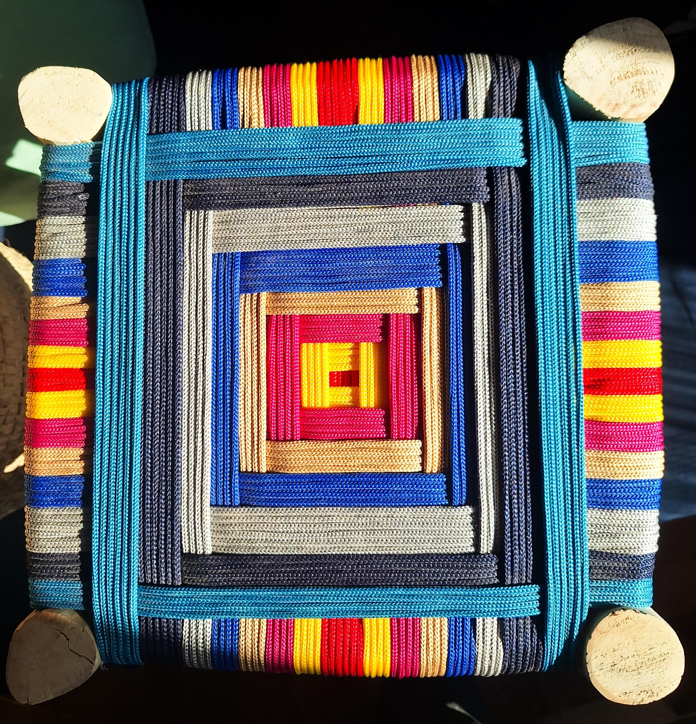 Boho stool in wood and colorful weaving