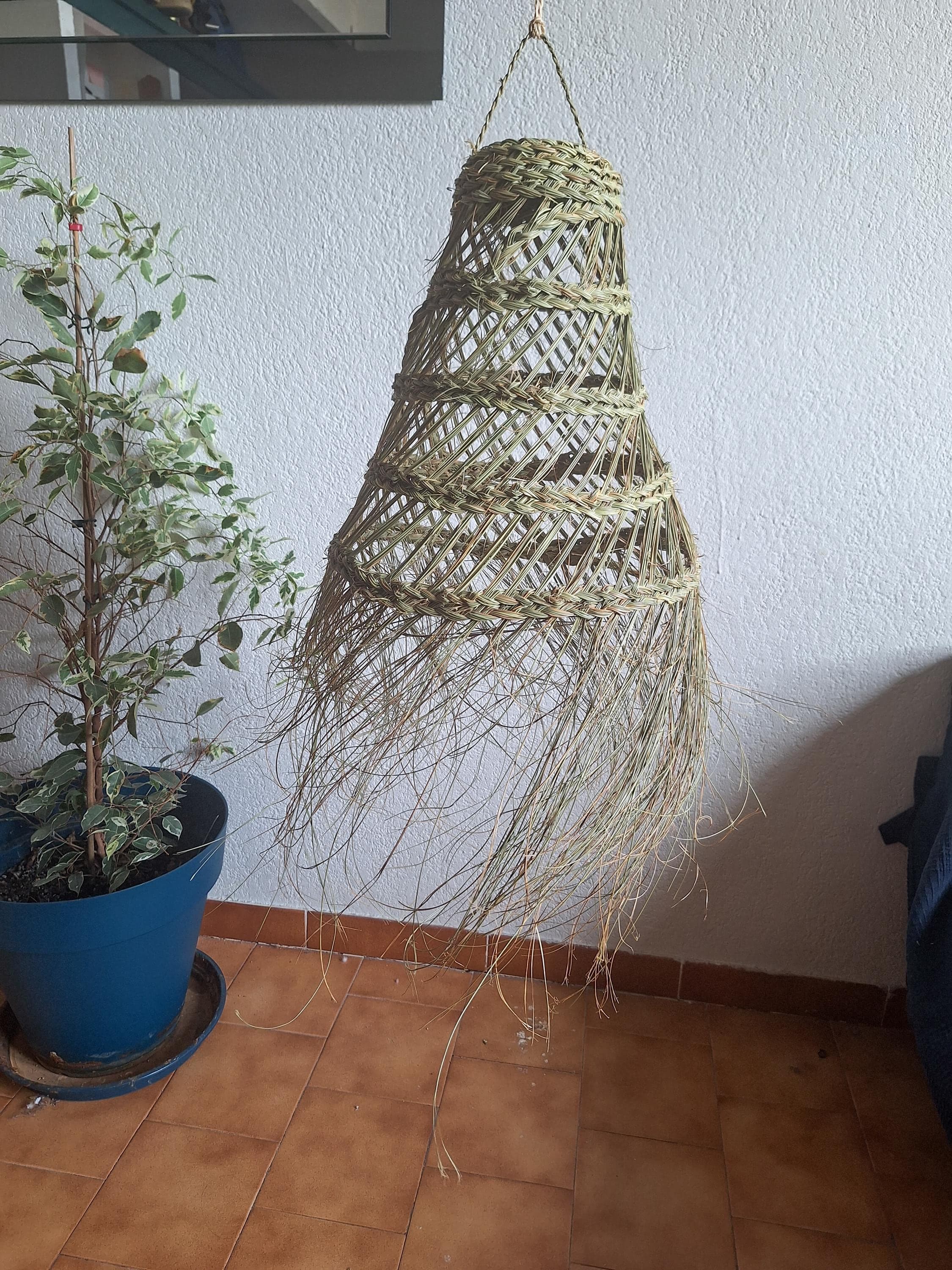 Openwork conical palm leaf pendant light