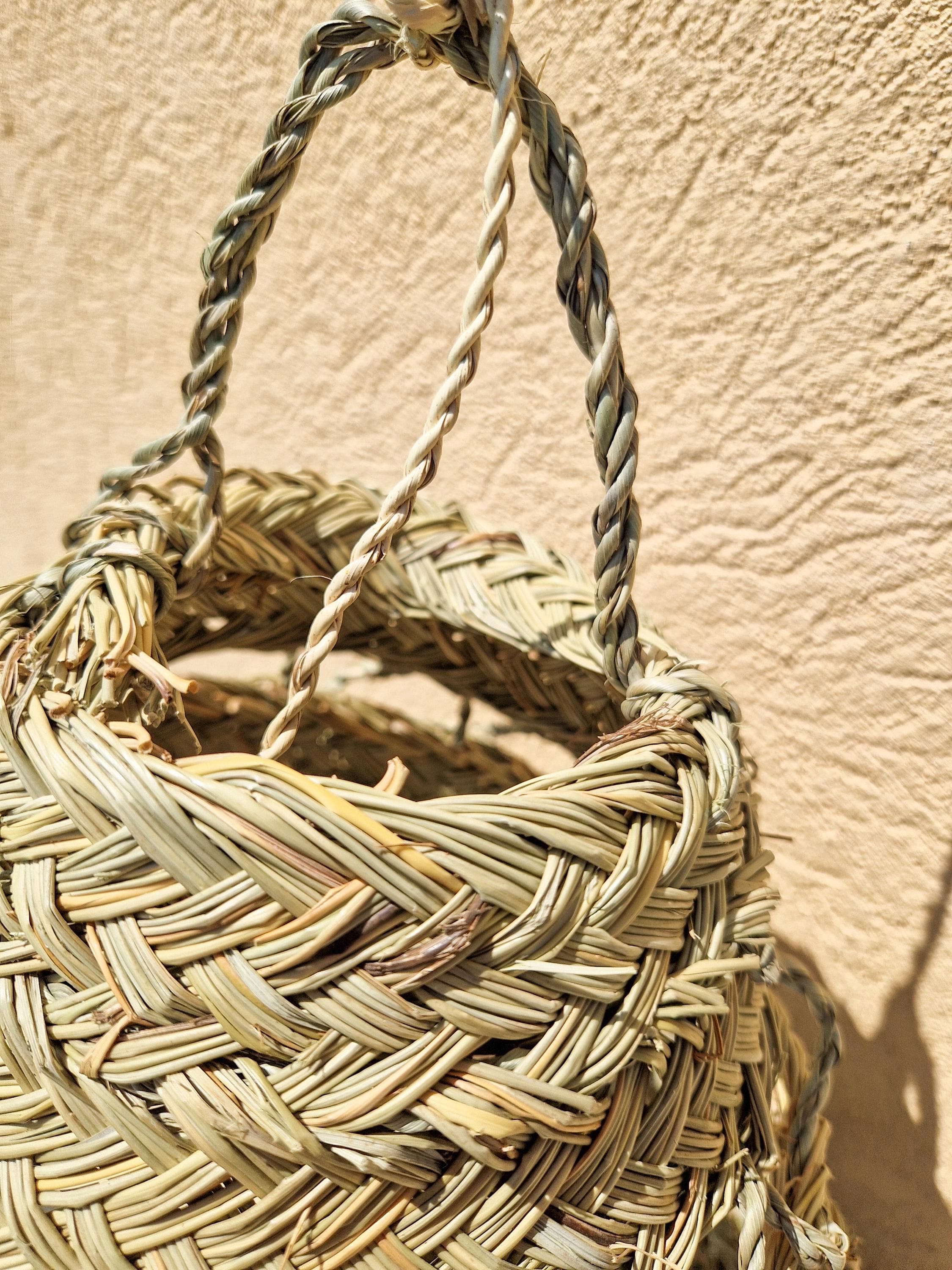 Suspension ajourée en feuille de palmier