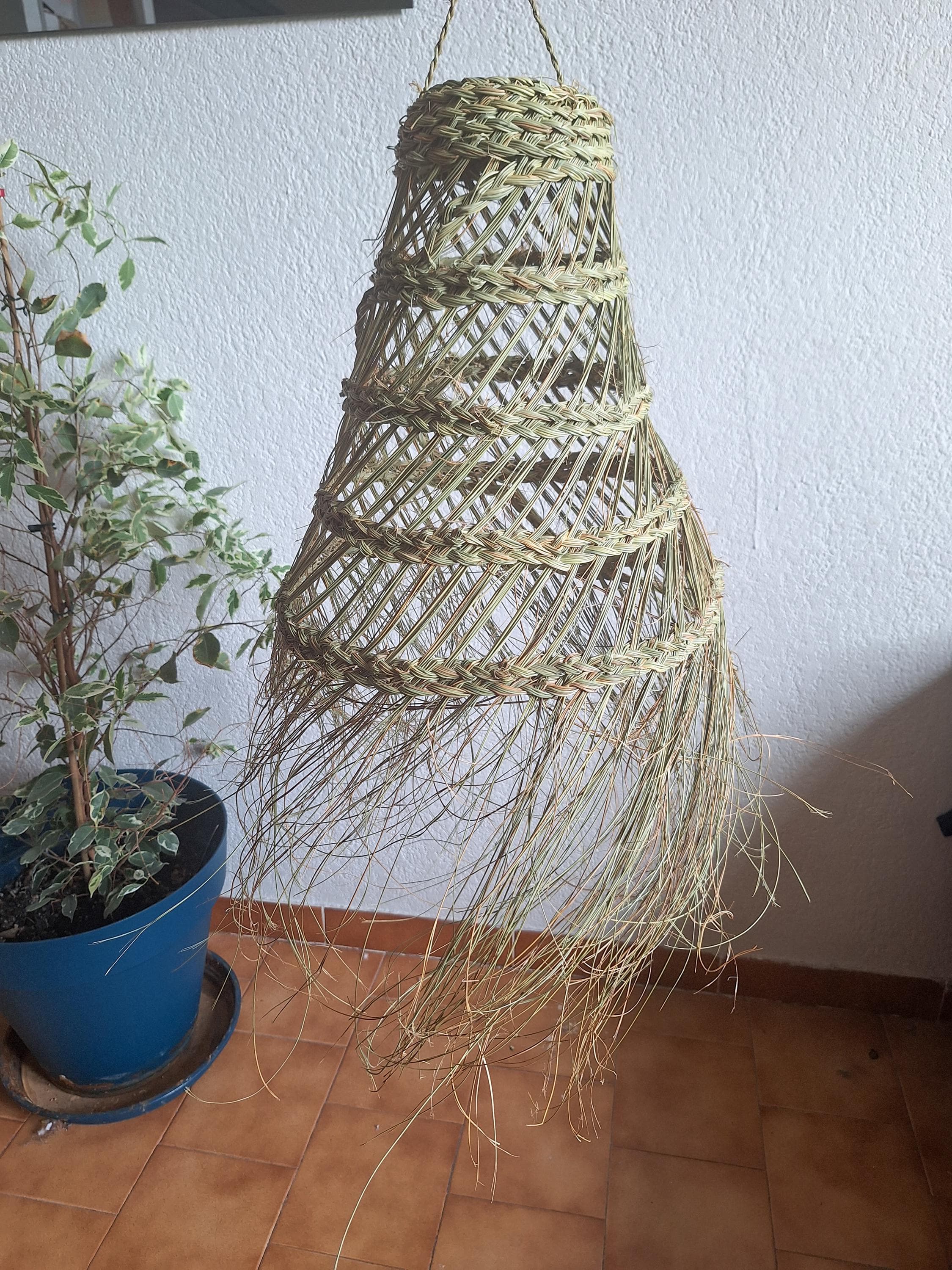 Openwork conical palm leaf pendant light