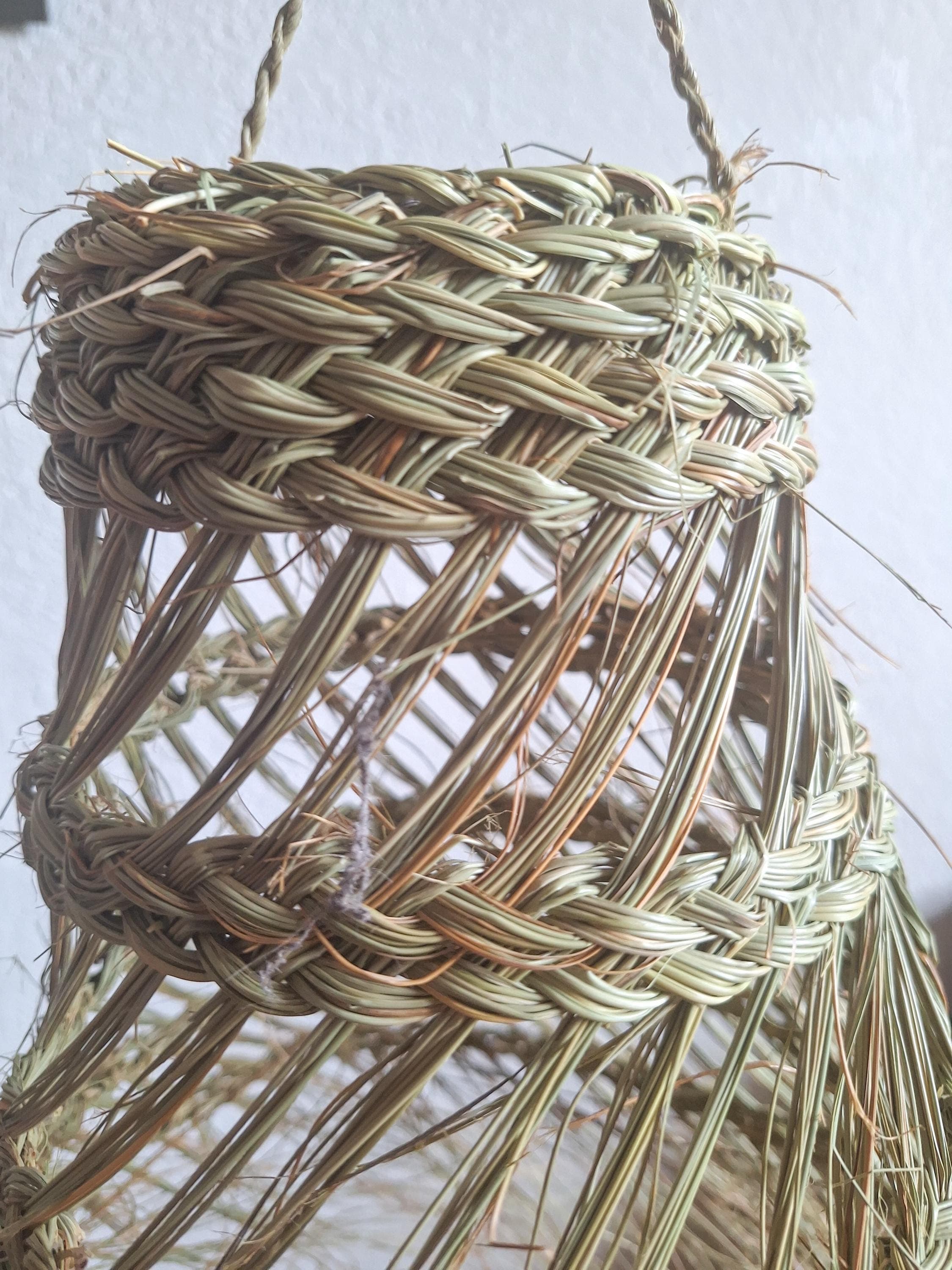 Openwork conical palm leaf pendant light