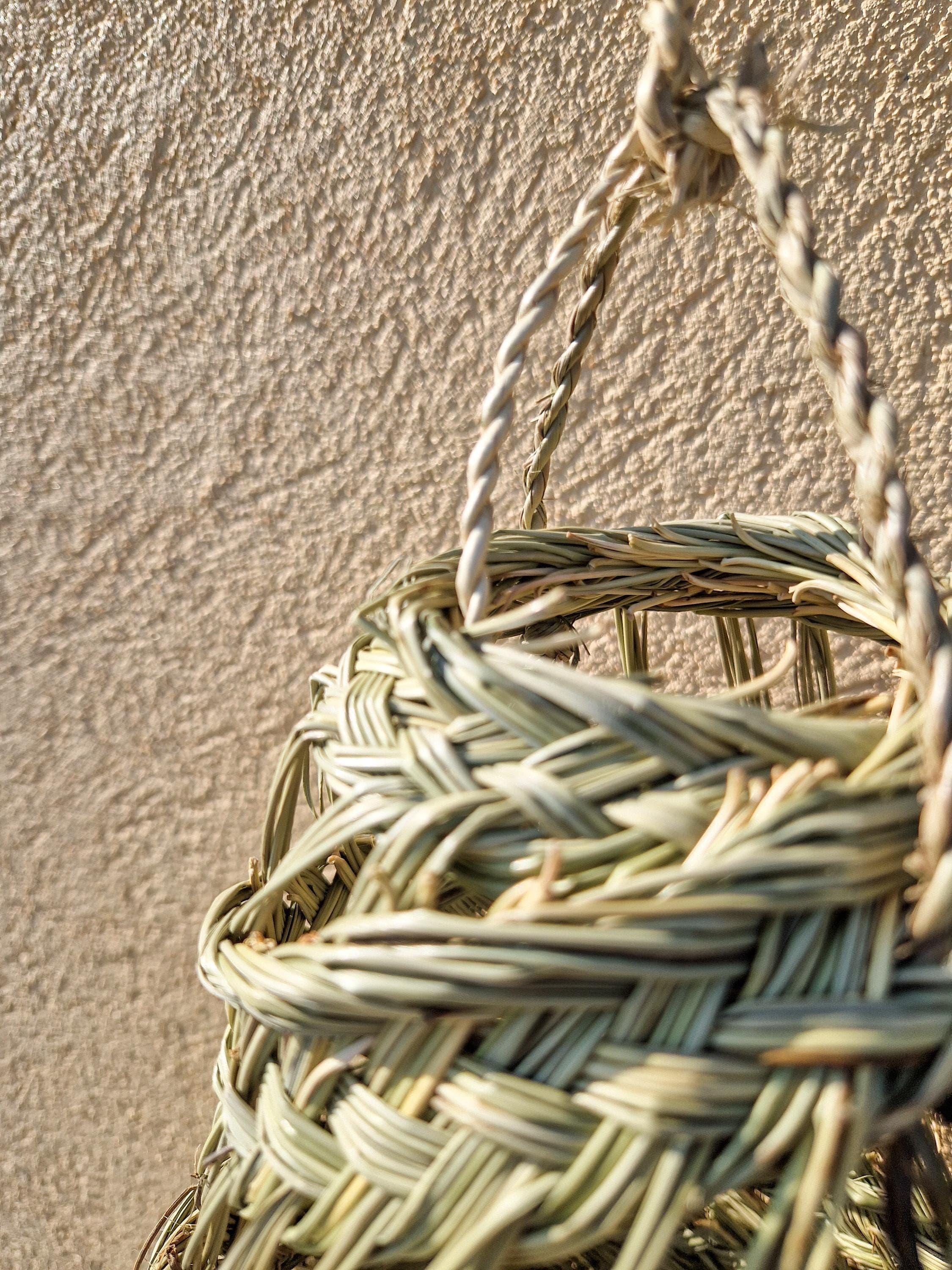 Suspension cylindrique ajourée en feuilles de palmier