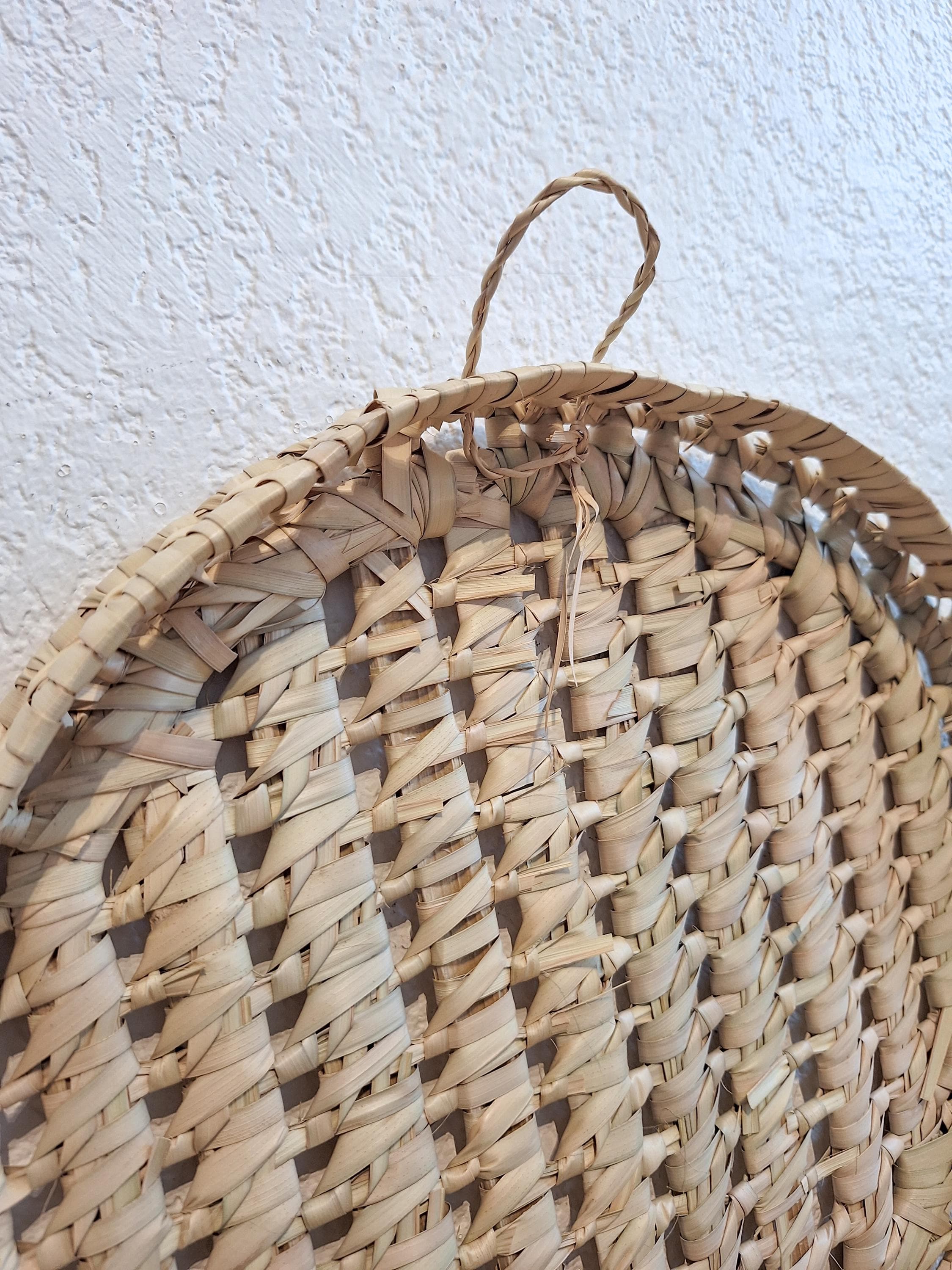 Malle de rangement circulaire en feuille de palmier