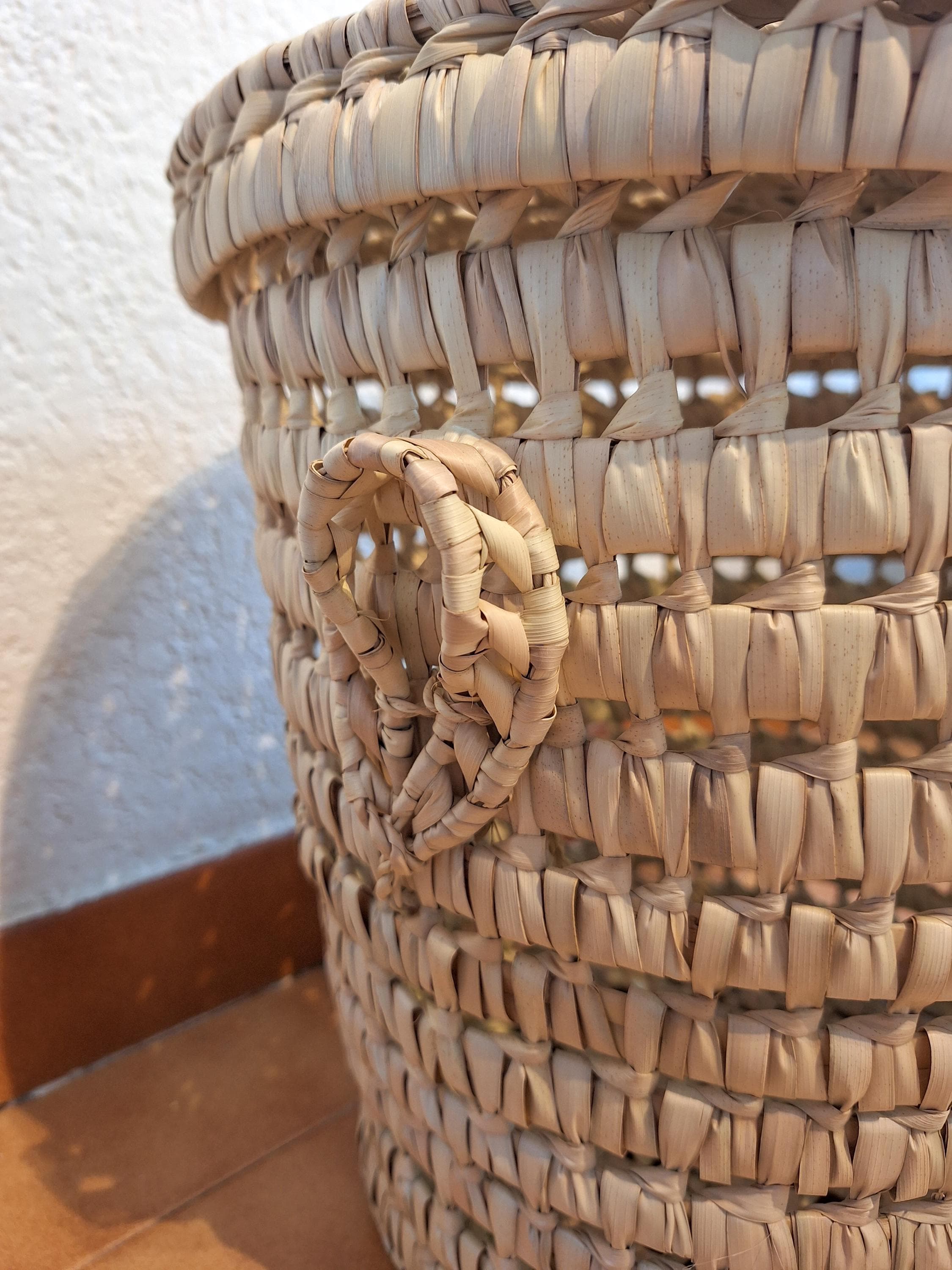 Malle de rangement circulaire en feuille de palmier