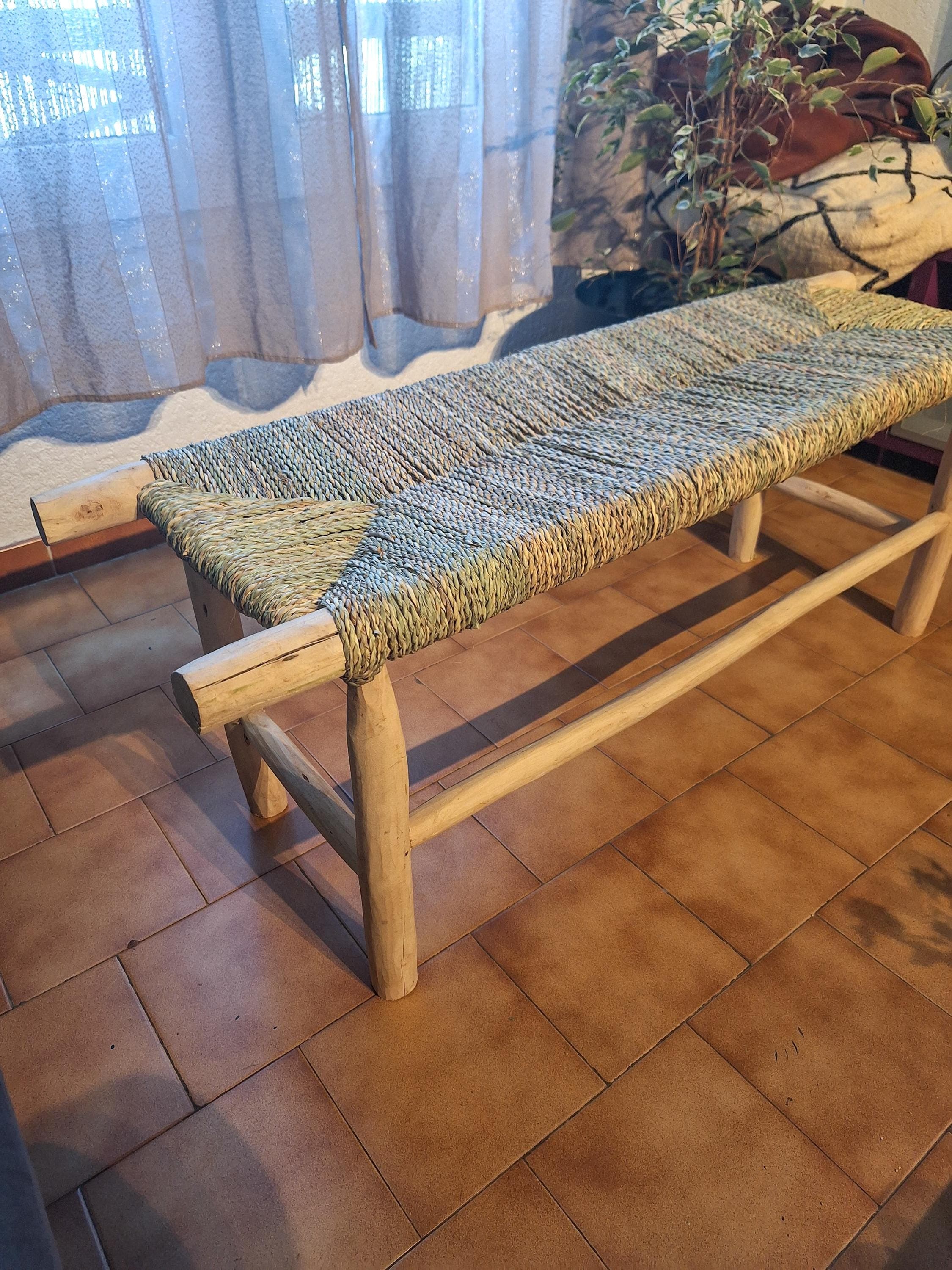 Wooden bench and natural palm leaf rope