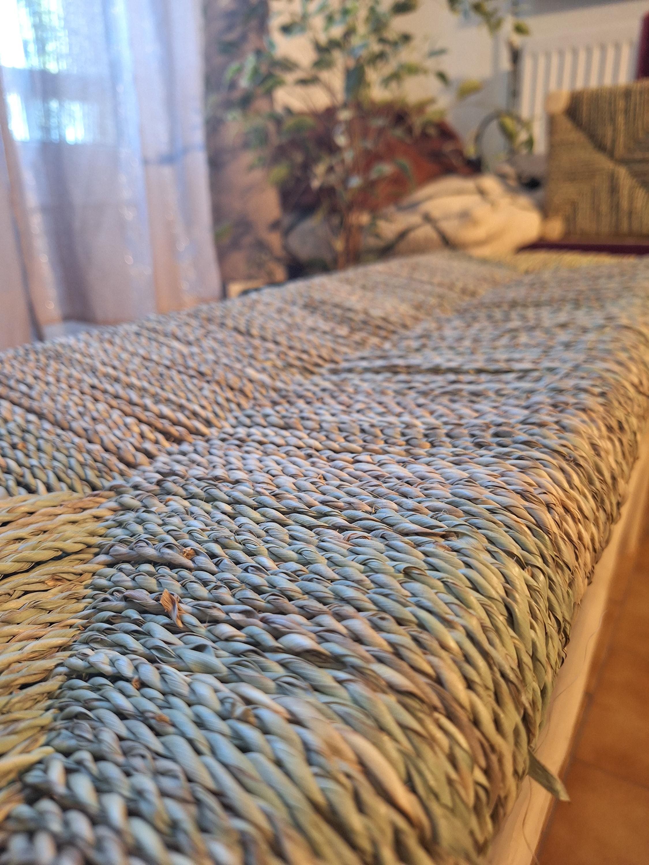 Wooden bench and natural palm leaf rope