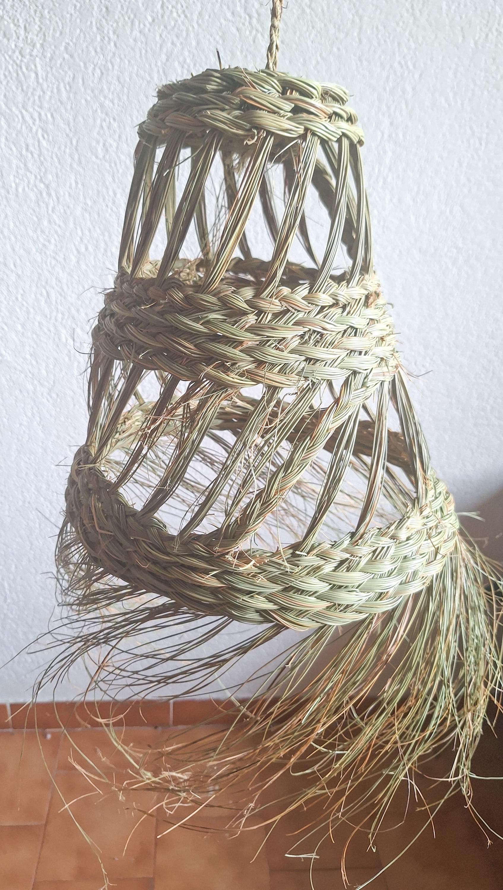 Openwork conical straw pendant light